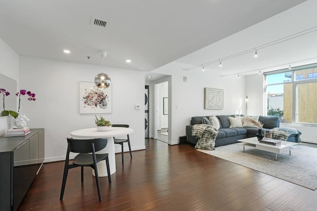 living room with dark hardwood / wood-style floors