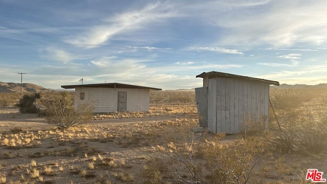 view of outdoor structure featuring a mountain view