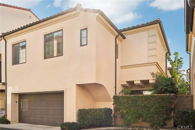 exterior space with a garage