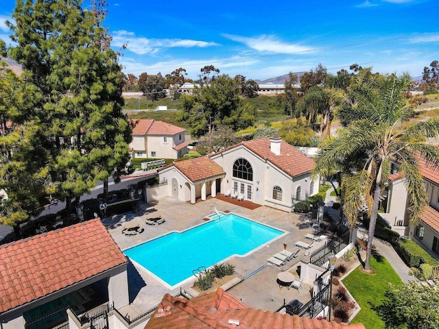 view of swimming pool with a patio area