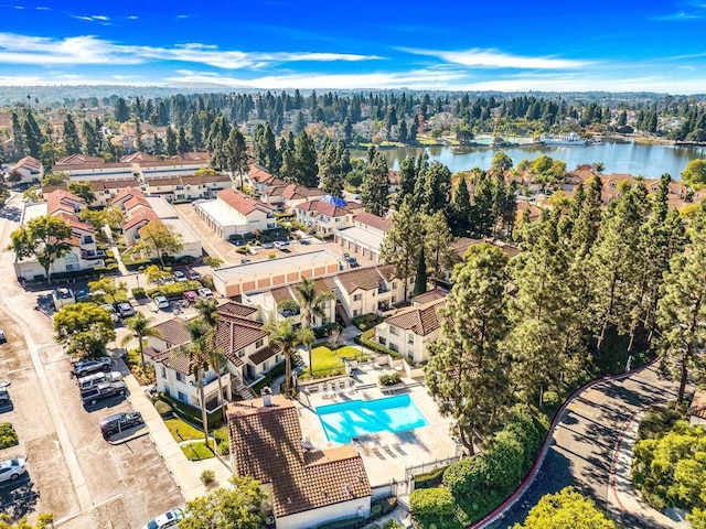 birds eye view of property featuring a water view