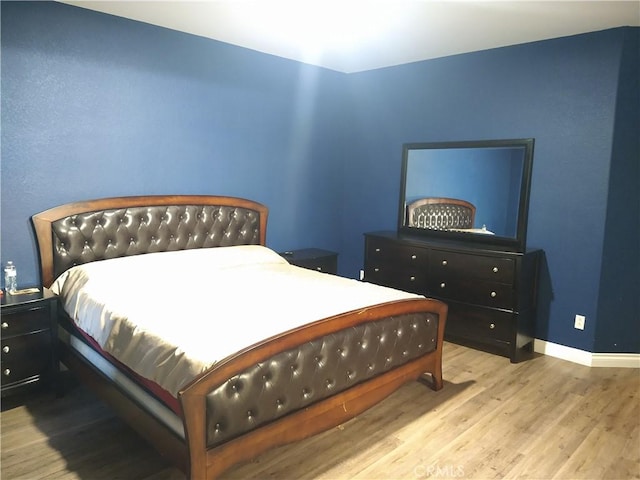 bedroom featuring light hardwood / wood-style flooring