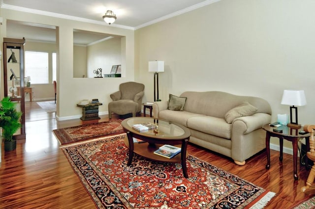 living room featuring hardwood / wood-style floors and ornamental molding