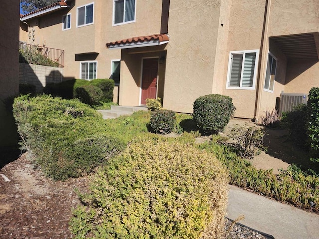 property entrance with central air condition unit