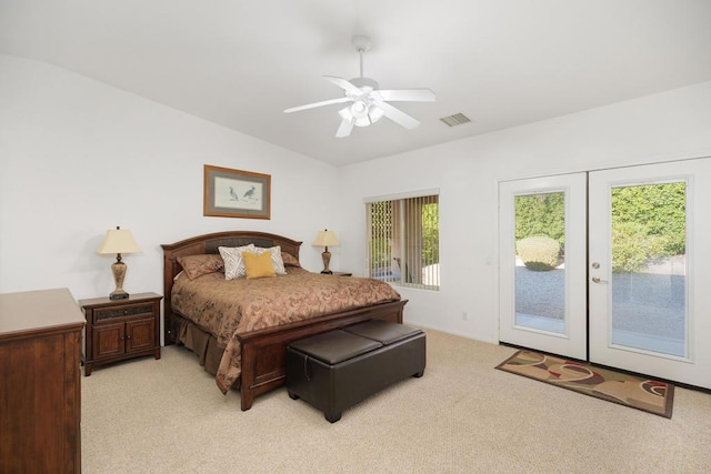 carpeted bedroom featuring ceiling fan, lofted ceiling, access to outside, and french doors