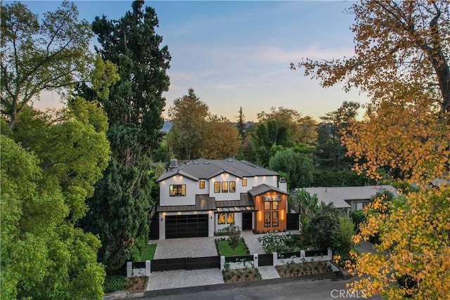 view of front of property with a garage