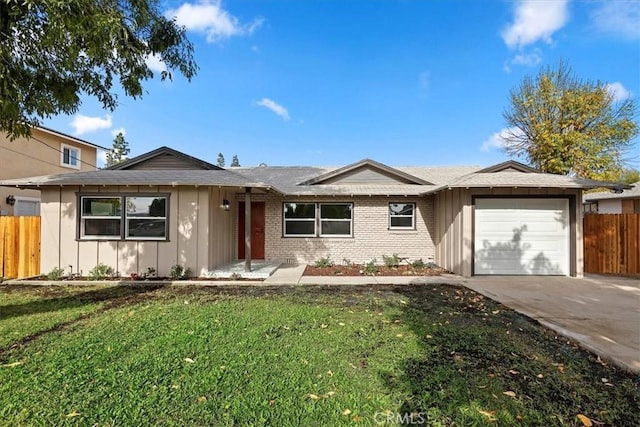 ranch-style house with a garage and a front yard