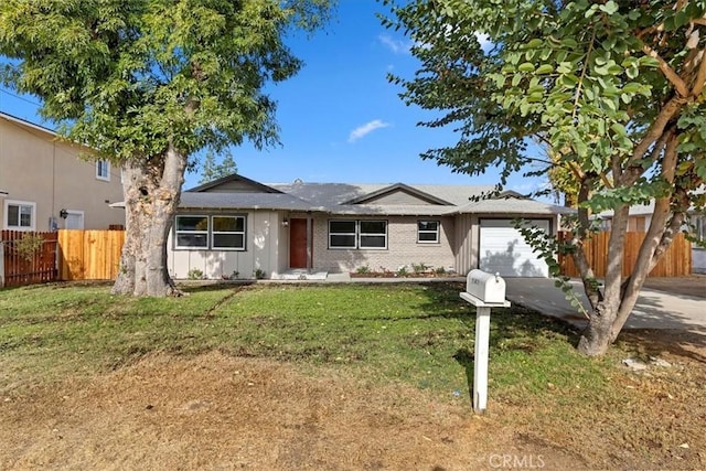 single story home featuring a front yard and a garage