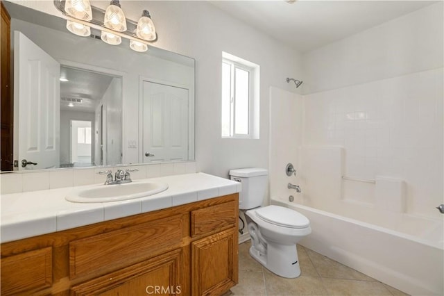 full bathroom with tile patterned floors, vanity, bathing tub / shower combination, and toilet