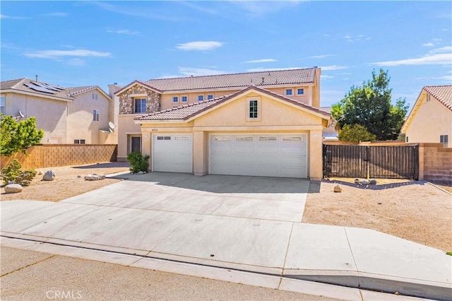 view of front of property featuring a garage