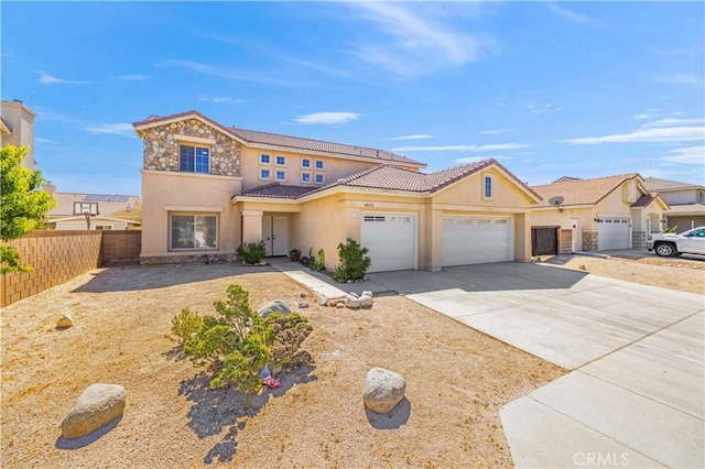 view of front of home with a garage