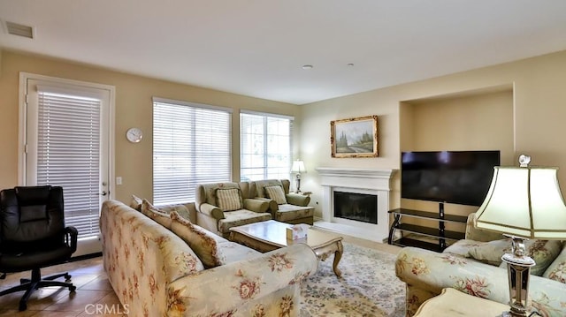 living room with tile patterned flooring