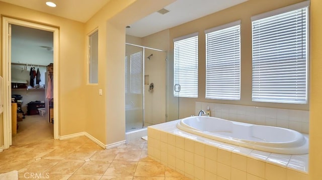 bathroom featuring tile patterned floors and an enclosed shower