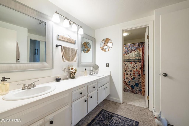 bathroom featuring vanity and walk in shower