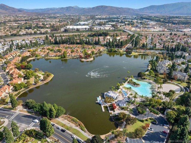 bird's eye view with a water and mountain view