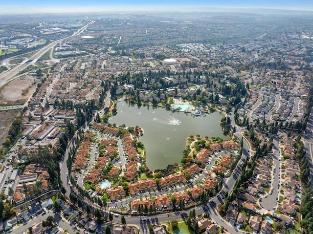 bird's eye view with a water view