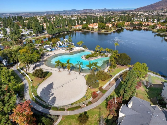 bird's eye view with a water and mountain view