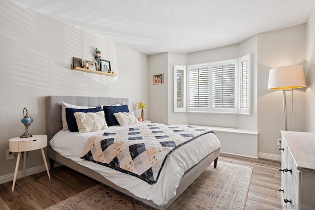 bedroom featuring light hardwood / wood-style flooring