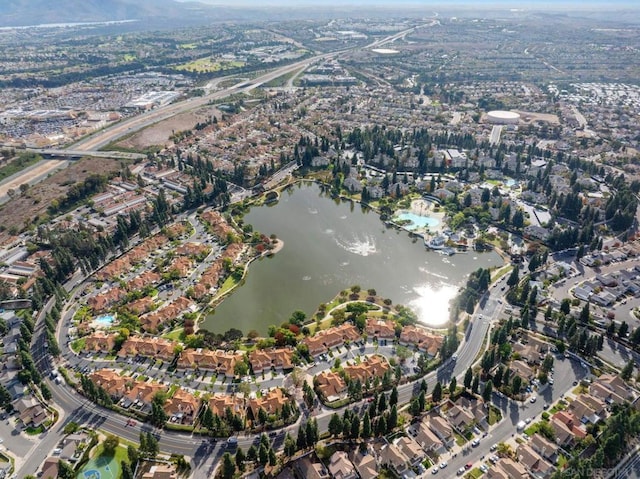 bird's eye view with a water view