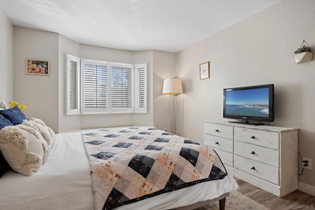 bedroom featuring light hardwood / wood-style flooring