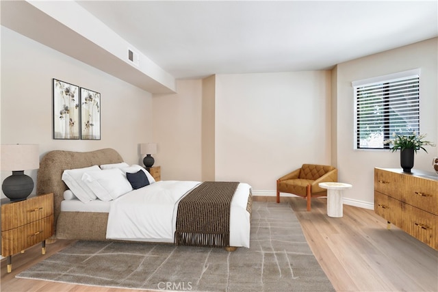 bedroom featuring hardwood / wood-style flooring