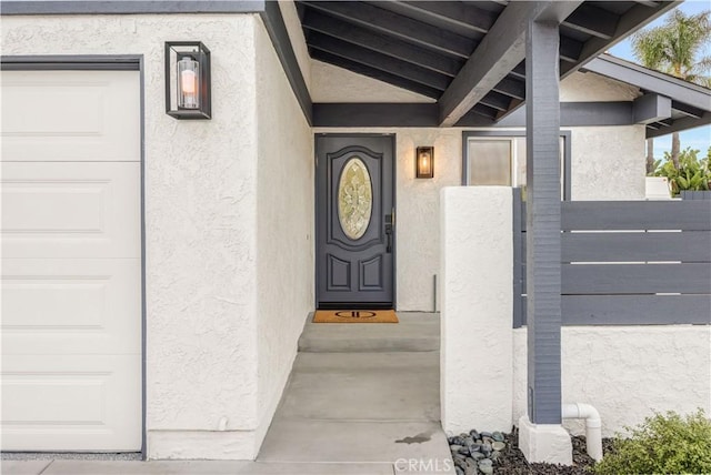 property entrance with a garage