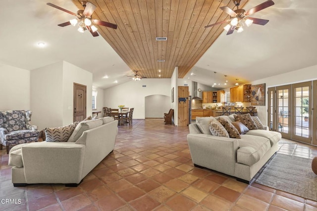 living room featuring ceiling fan, french doors, high vaulted ceiling, and wood ceiling