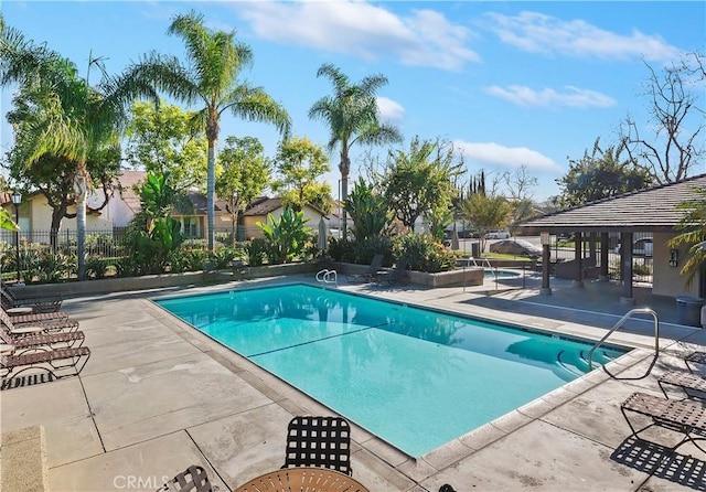 view of pool featuring a patio area