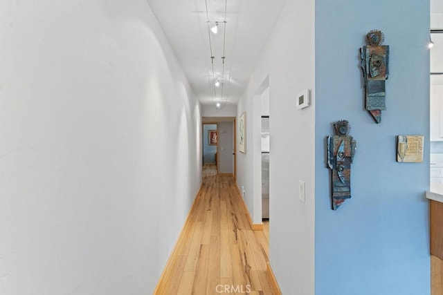 hallway featuring light hardwood / wood-style floors