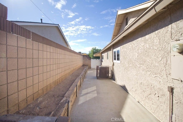 view of side of property featuring cooling unit