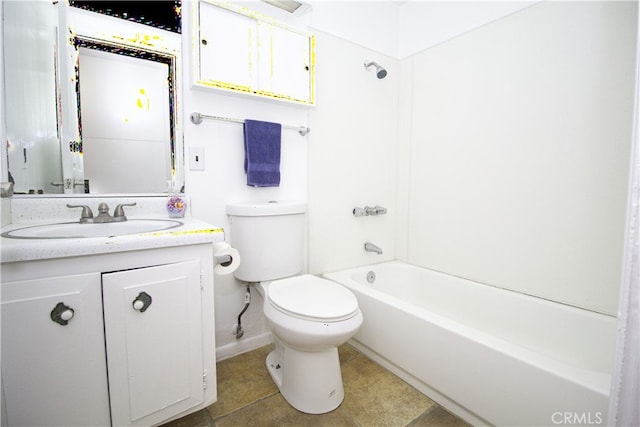 full bathroom featuring tile patterned floors, vanity, toilet, and washtub / shower combination