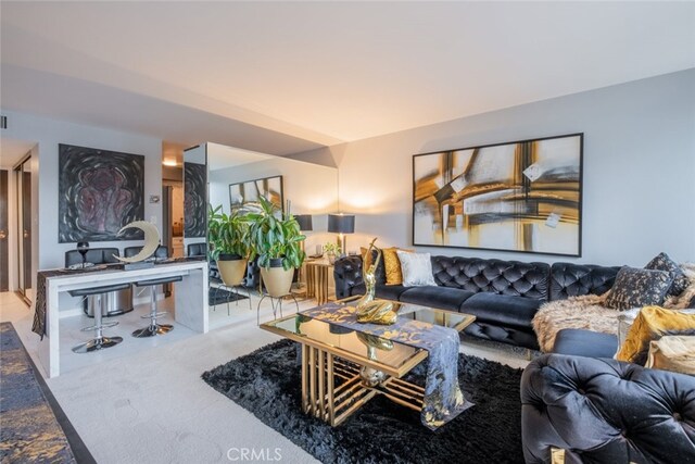 living room featuring carpet floors