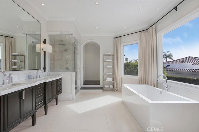 1 Moss Lndg, Laguna Niguel, CA 92677 - full bath featuring a shower stall, a freestanding tub, double vanity, crown molding, and recessed lighting