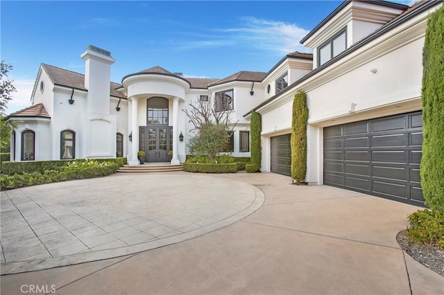 view of front of home with a garage