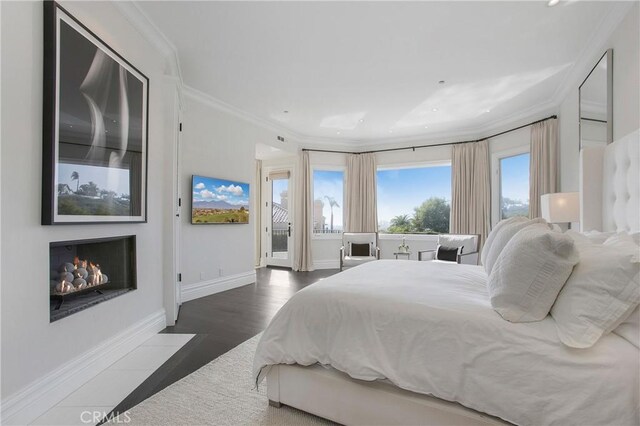 1 Moss Lndg, Laguna Niguel, CA 92677 - bedroom with ornamental molding, access to exterior, recessed lighting, and wood finished floors
