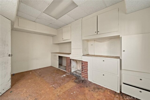 kitchen featuring a paneled ceiling