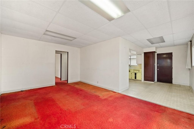 empty room with a drop ceiling