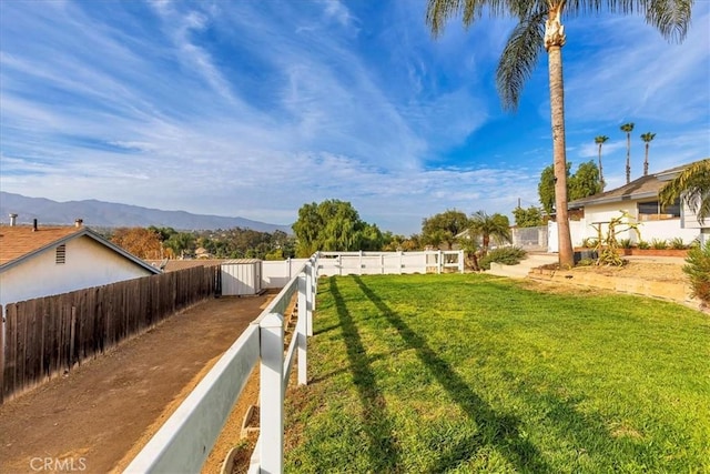 view of yard with a mountain view