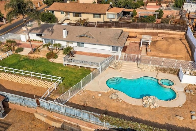 view of swimming pool with a patio