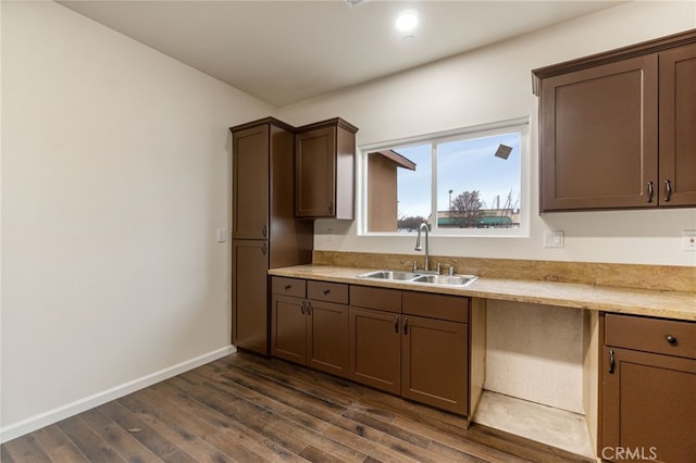 kitchen featuring dark hardwood / wood-style floors and sink