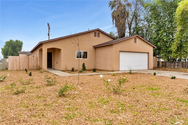 view of front of home with a garage