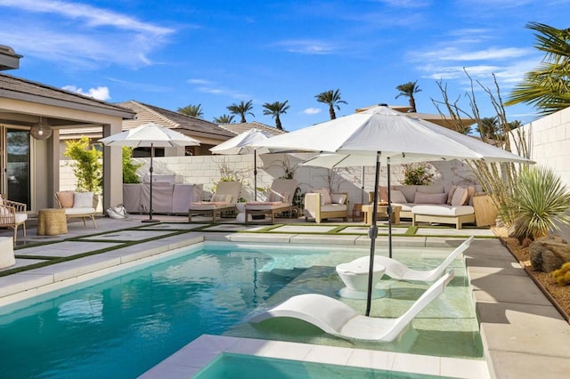 view of swimming pool with an outdoor hangout area and a patio area