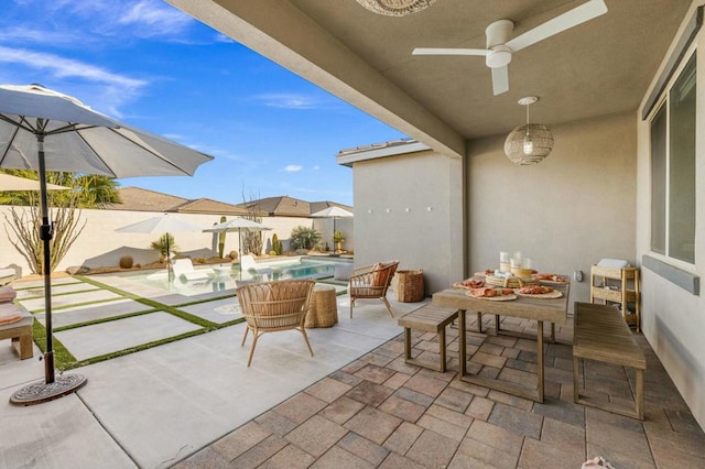 view of patio with ceiling fan