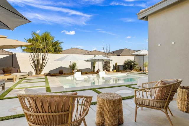 view of swimming pool featuring a patio