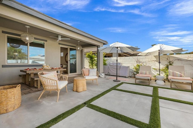 view of patio / terrace with ceiling fan