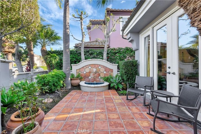 view of patio / terrace featuring french doors