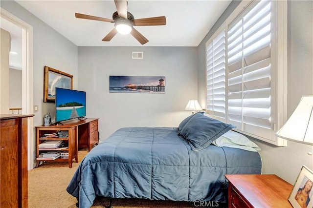 bedroom with carpet flooring and ceiling fan