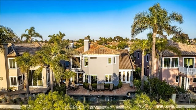 rear view of property with a patio