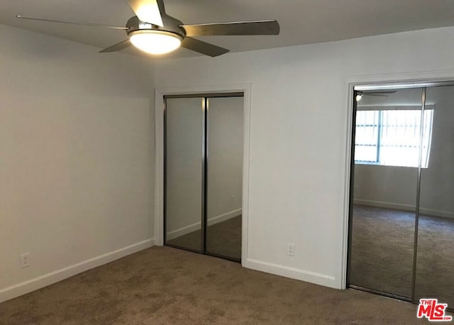 unfurnished bedroom with carpet flooring and ceiling fan