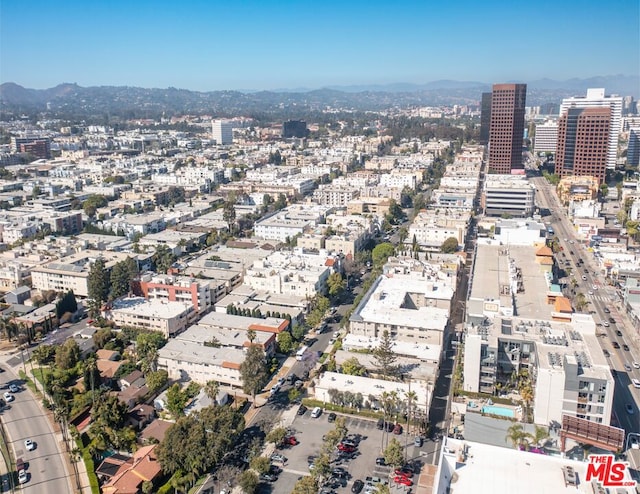 bird's eye view with a mountain view